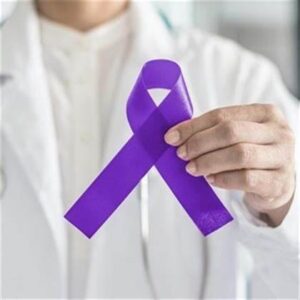 A person holding up a purple ribbon in front of their face.